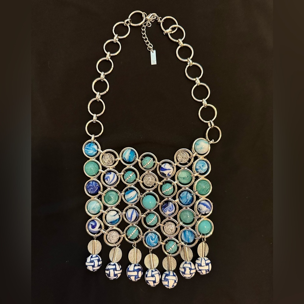 INC silver tone and faux blue bead necklace.